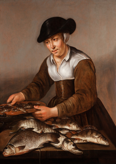 A Fisherman and Fisherwoman with fish on a table by Pieter de Putter