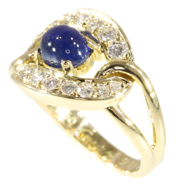 Vintage luxury CARTIER ring with sapphire and diamonds by Cartier