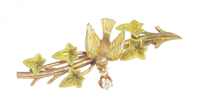 Vintage antique gold bar brooch bird holding diamond in beak on ivy branch by Unknown artist