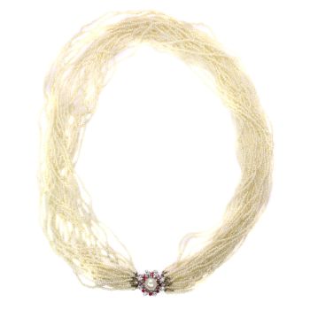Vintage pearl necklace with 13000+ pearls and white gold diamond ruby closure by Unknown Artist