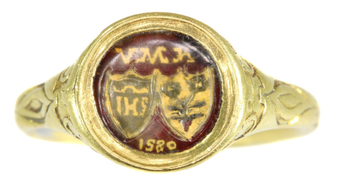 Renaissance brotherhood ring with two coat of arms behind transparant window by Artista Desconocido