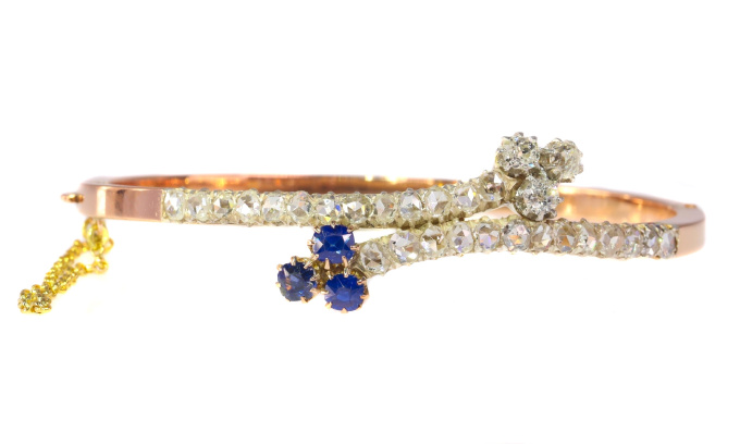 Victorian diamond and sapphire cross over bangle by Unknown artist