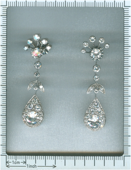 Vintage long pendent platinum cocktail ear jewels abundantly set with diamonds by Artiste Inconnu