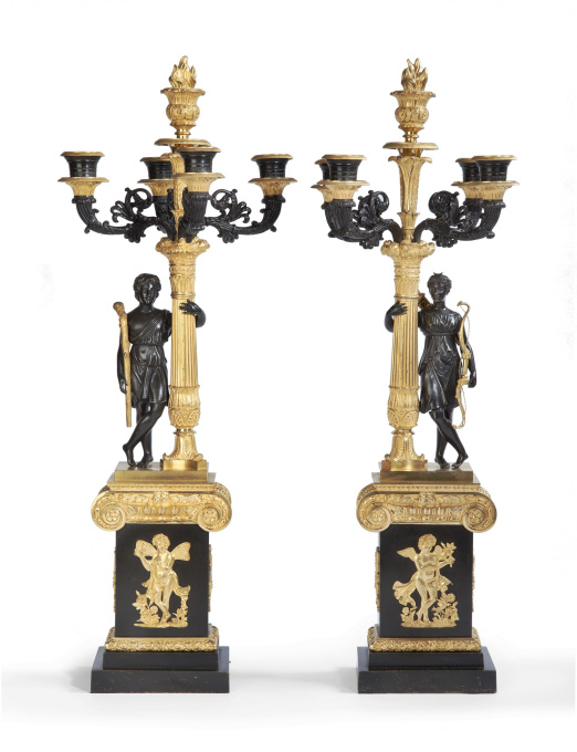A pair of restauration five-light candelabra by Artista Sconosciuto