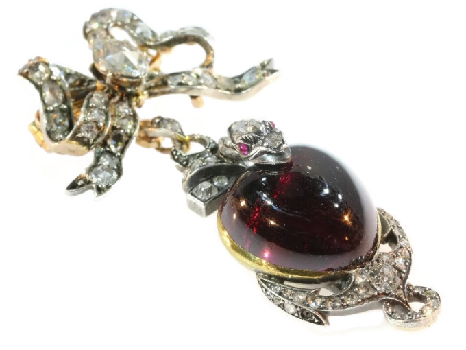 Early-Victorian diamond brooch-pendant medallion large heart shaped garnet cabochon snake anchor and bow by Unknown artist