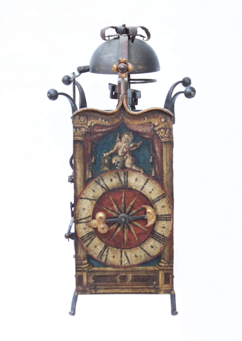 A large South German gothic polychrome painted iron wall clock, circa 1600 by Onbekende Kunstenaar