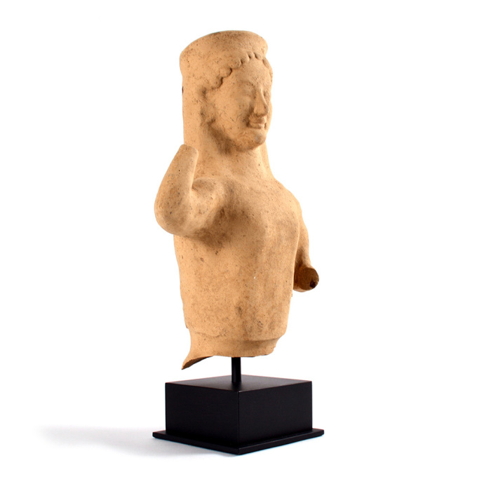 A Greek terracotta bust of a Kore, Archaic by Unknown Artist