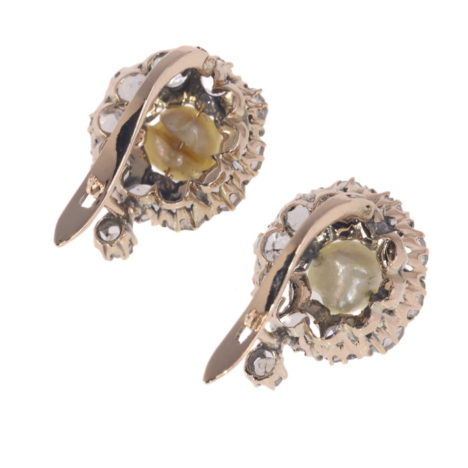 Victorian pink gold earrings set with rose cut diamonds and natural pearls by Artista Desconhecido