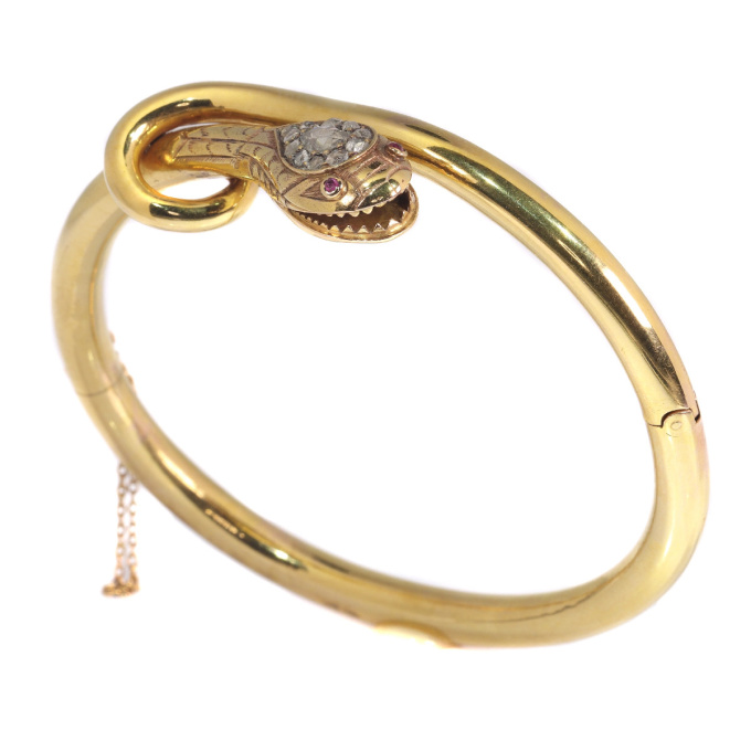 Antique snake bangle set with diamonds and rubies by Artista Sconosciuto