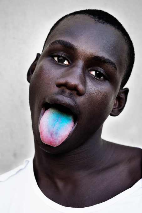 The boy with the blue tongue by Ernst Coppejans