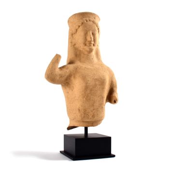 A Greek terracotta bust of a Kore, Archaic by Artista Desconocido