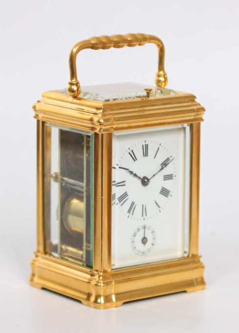 A fine French gilt brass Gorge case repeating alarm carriage clock, circa 1880. by Onbekende Kunstenaar