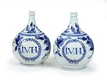 A PAIR OF JAPANESE BLUE AND WHITE ARITA PORCELAIN BOTTLES WITH THE INITIALS OF GOVERNOR-GENERAL JOAN VAN HOORN OF THE FORMER DUTCH INDIES by Unknown Artist