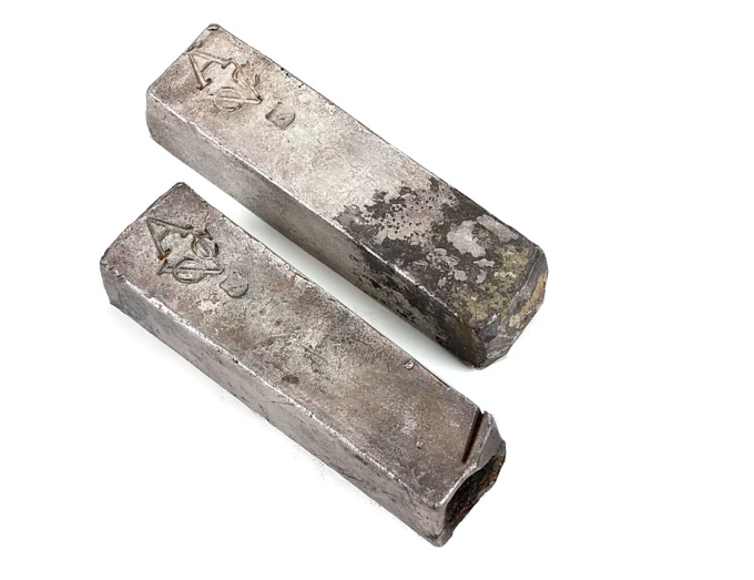 TWO SILVER 'V.O.C. AMSTERDAM' INGOTS by Unknown Artist
