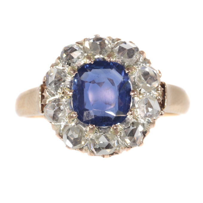 Victorian antique engagement ring with natural sapphire and ten rose cut diamonds by Unknown artist