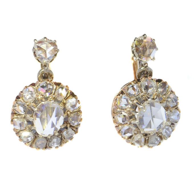 Vintage antique diamond earrings with rose cut diamonds by Artista Desconocido