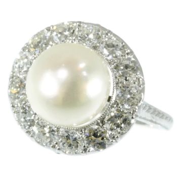Diamond and pearl platinum estate engagement ring by Artista Desconocido