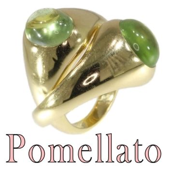 Original intertwined gold Pomellato rings with green garnets - demantoid by Unknown Artist
