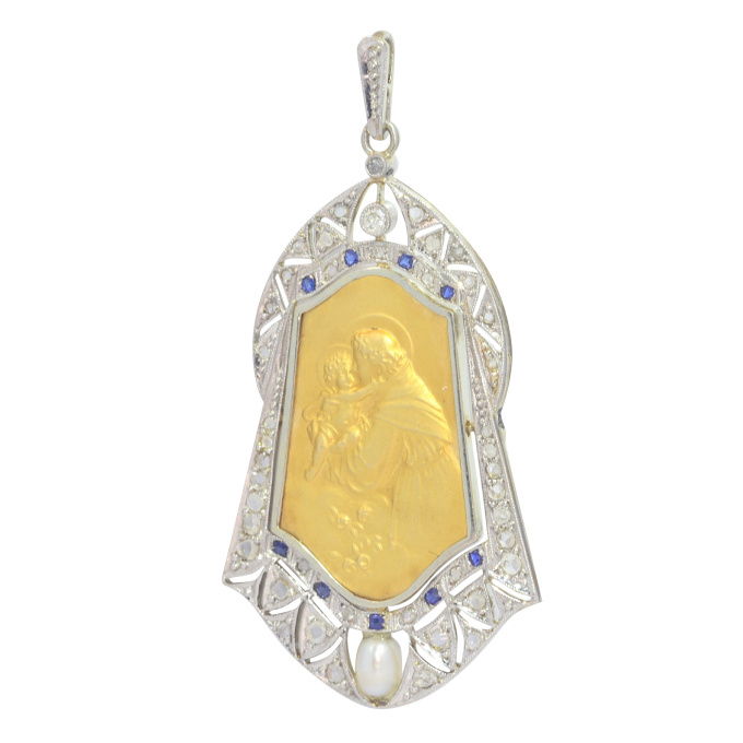 Vintage 1910's medal 18K gold pendant set with diamonds sapphires and pearl St. Anthony of Padua depicted holding the Child Jesus by Artista Desconhecido