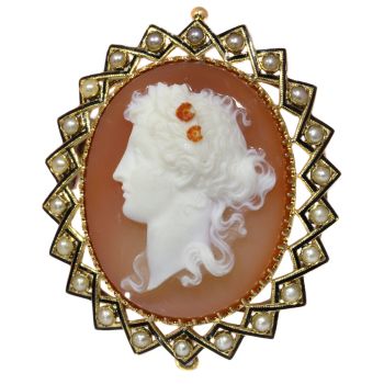 Victorian hard stone cameo in gold mounting with half seed pearls black enamel by Unknown Artist