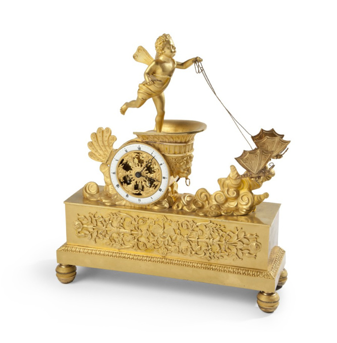 Empire Gilt Bronze Mantel clock with a winged putto by Onbekende Kunstenaar
