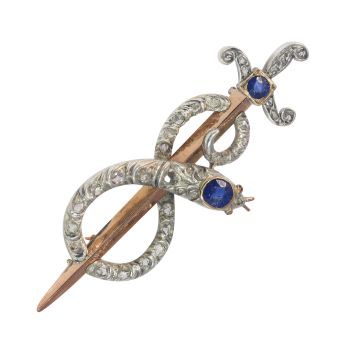 Antique gold diamond and sapphire brooch snake wrapped around sword or dagger by Unknown artist