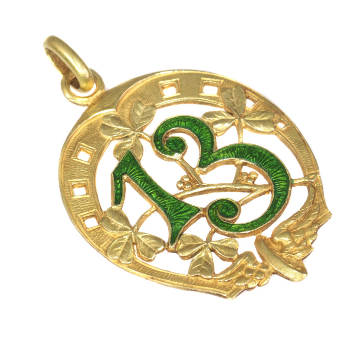 Antique enameled gold lucky charm horse shoe 13 winged wheel and clover by Artista Desconocido