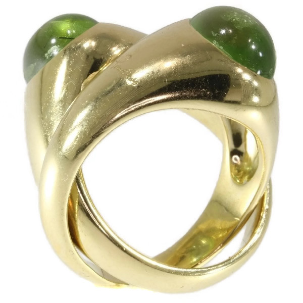 Original intertwined gold Pomellato rings with green garnets - demantoid by Unknown artist