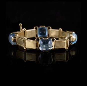 Yellow gold bracelet set with four large cabuchon cut aquamarines by Unknown artist