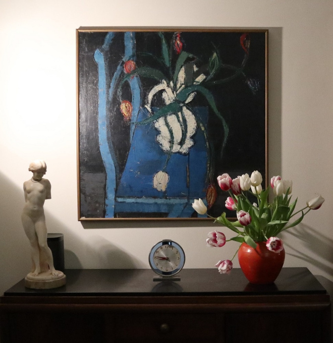 Tulips on a blue chair by Désiré Haine