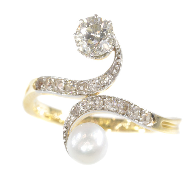 Elegant Belle Epoque diamond and pearl engagement ring so called toi et moi by Artista Desconhecido