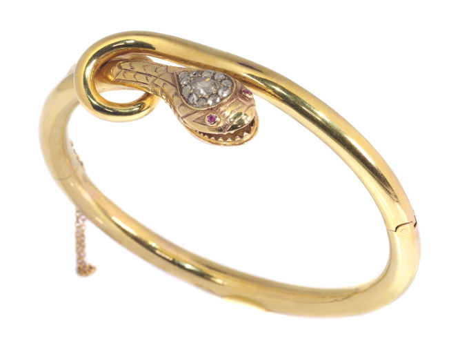 Antique snake bangle set with diamonds and rubies by Artista Sconosciuto