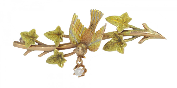 Vintage antique gold bar brooch bird holding diamond in beak on ivy branch by Artiste Inconnu