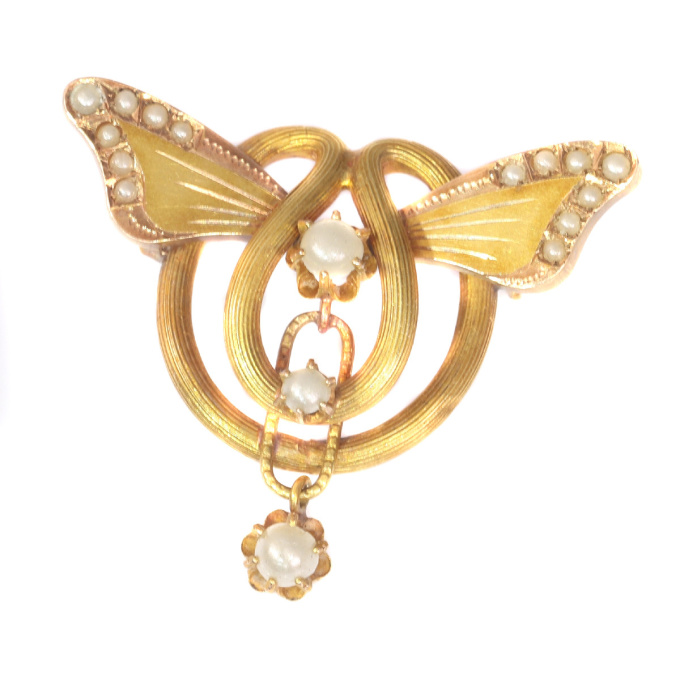 Antique gold brooch with butterfly wings set with half seed pearls by Artiste Inconnu