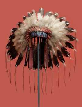 A Lakota warrior’s feather headdress North or South Dakota, United States of America by Artiste Inconnu