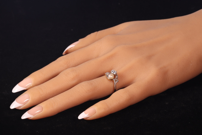 Vintage Belle Epoque diamond and pearl romantic toi-et-moi engagement ring by Artista Desconocido