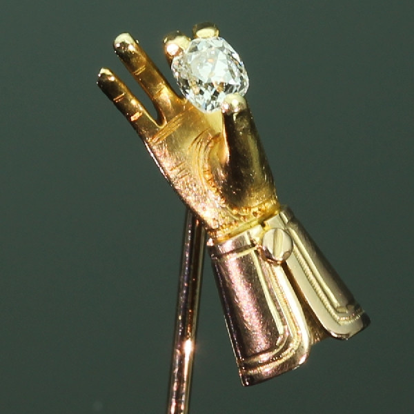 Antique Victorian tiepin gloved hand holding old cushion cut diamond by Unknown Artist