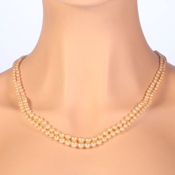 French vintage double strand pearl necklace with diamond closure by Unknown Artist