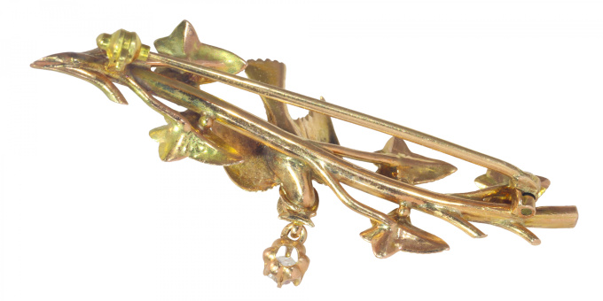 Vintage antique gold bar brooch bird holding diamond in beak on ivy branch by Artiste Inconnu