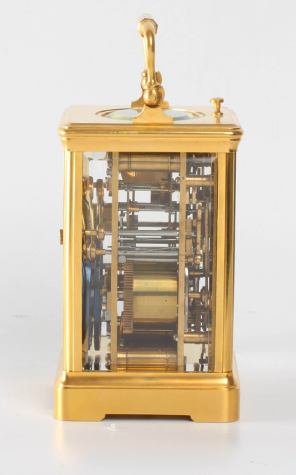 A French gilt brass quarter striking alarm carriage clock, circa 1890 by Artista Desconocido