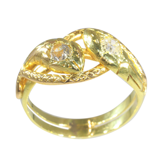 Vintage antique 18K gold double headed diamond snake ring by Artista Desconocido