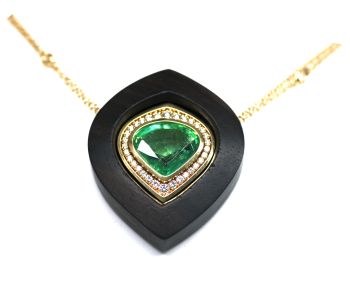 Pendant executed with an emerald with detachable ebony edge(18 krt jellow) gold by Puck Eigenmann