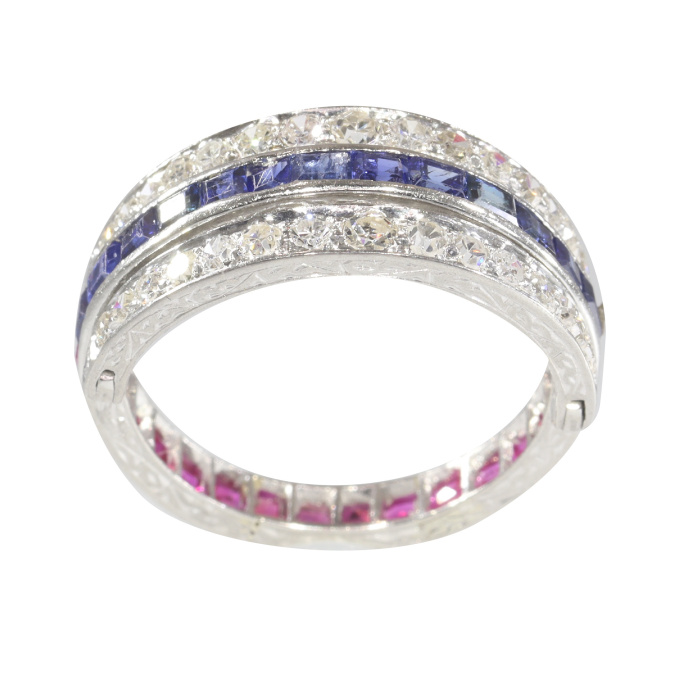Magnificent eternity band with rubies and sapphires and hinged diamond parts by Unknown artist