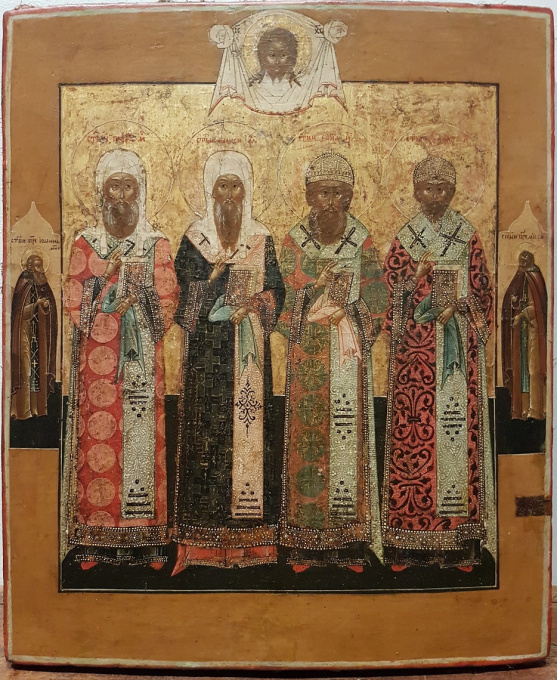 Antique Russian icon: The Four Holy Patriarchs of Moscow by Onbekende Kunstenaar