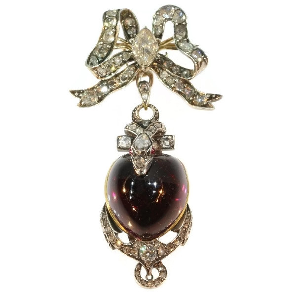 Early-Victorian diamond brooch-pendant medallion large heart shaped garnet cabochon snake anchor and bow by Artista Sconosciuto