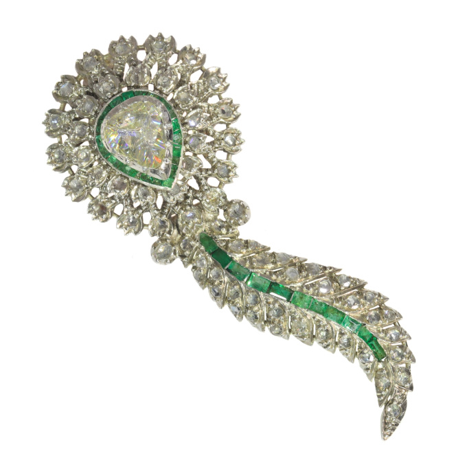 Antique brooch with large pear shaped rose cut diamond and set with many rose cut diamonds and carre cut emeralds by Artista Desconhecido