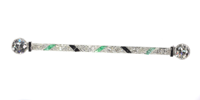 Vintage Art Deco platinum diamond bar brooch also set with onyx and emeralds by Artista Sconosciuto