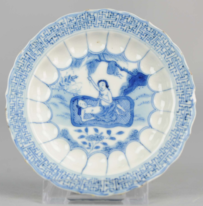 Blue and white saucer decorated with a pregnant lady, early 18th century by Unknown Artist