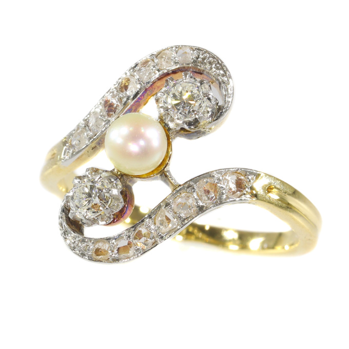Antique diamond and pearl cross-over engagement ring by Onbekende Kunstenaar