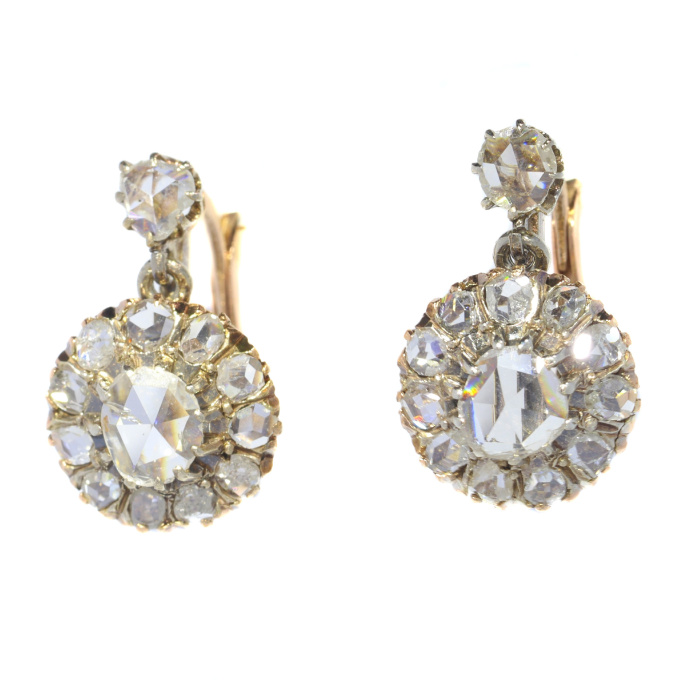 Vintage antique diamond earrings with rose cut diamonds by Artista Desconocido